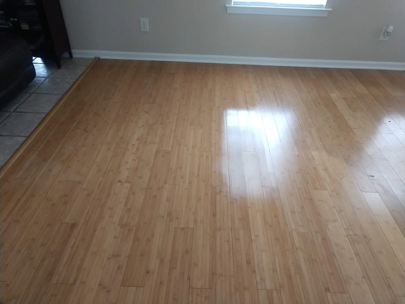 After: the same floor clean, the window light shining on it.