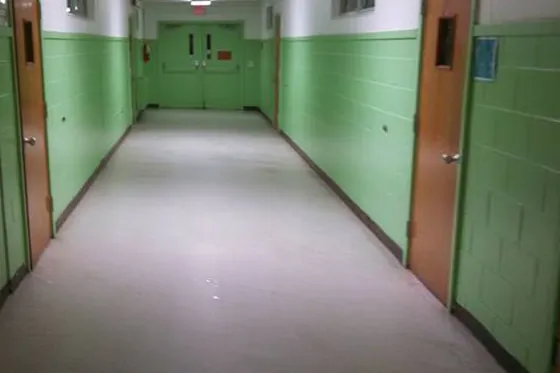 Before: a long school hallway with a dull, flat floor.