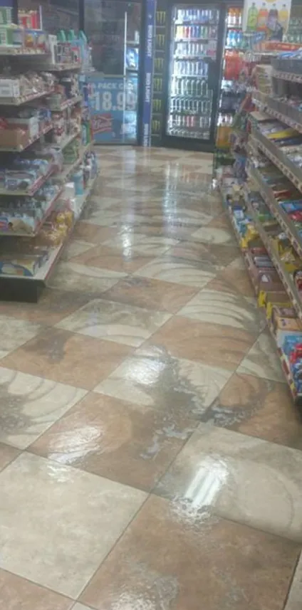 Before: a store aisle with a dull, grimy checkered floor.